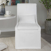 Uttermost Coley armless side chair with upholstered fabric and wooden legs, modern and stylish seating for living spaces.