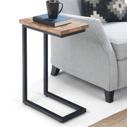 Skyler C side handcrafted table by Simpli-Home, featuring a sleek design and natural wood finish, ideal for modern living spaces.