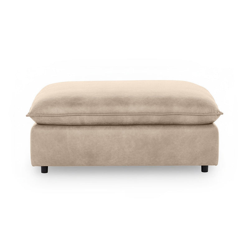 Classic Home Caplan upholstered ottoman with plush fabric and sturdy wooden legs, perfect for living room decor.