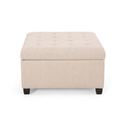 Noble House Isabella contemporary storage ottoman with cushioned top and wooden legs, serving as a versatile living room accent piece.