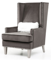 Elegant traditional arm chair by Glory Furniture with ornate wooden frame and plush fabric upholstery.