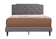 Upholstered button tufted bed by Glory Furniture with a cozy, plush fabric and elegant design for comfortable bedroom decor
