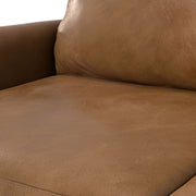 Livingston upholstered stationary sofa by Simpli-Home, featuring plush fabric and cushioned armrests in a cozy living room setting.