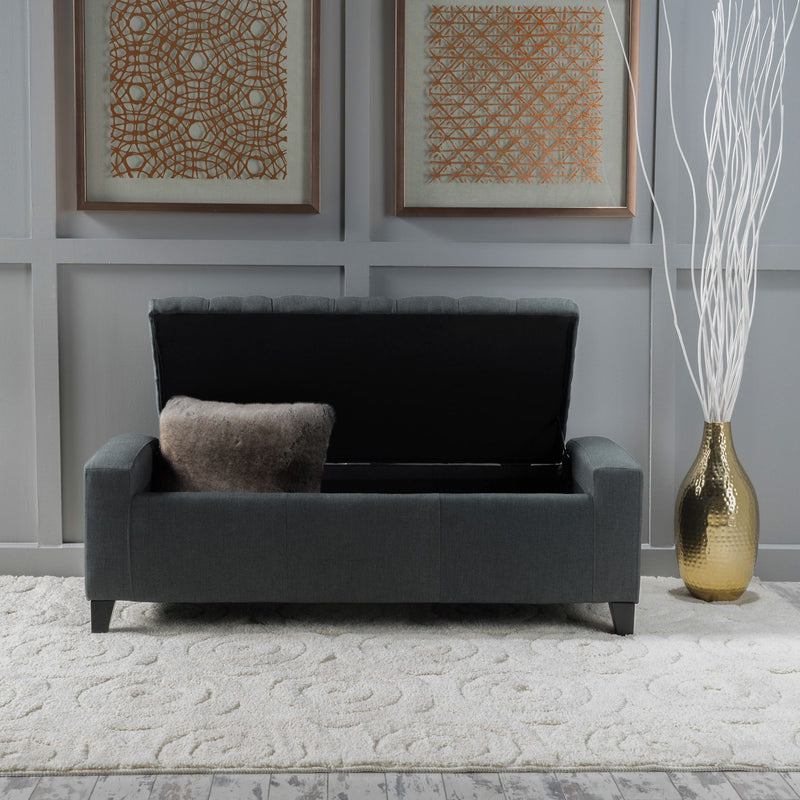 Dark gray storage ottoman with tufted top from Noble House, contemporary design, soft fabric, and spacious interior for storage.