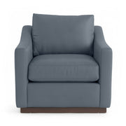 Classic Home Aspen accent arm chair with plush upholstery and wooden legs, stylishly designed for living room decor.