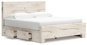 Signature Design by Ashley Lawroy panel bed with integrated storage drawers in dark wood finish, showcasing a modern bedroom furniture piece.