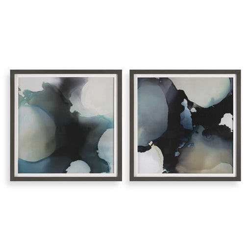 Set of two black abstract framed prints with telescopic design by Uttermost, featuring modern wall art with sleek black frames.