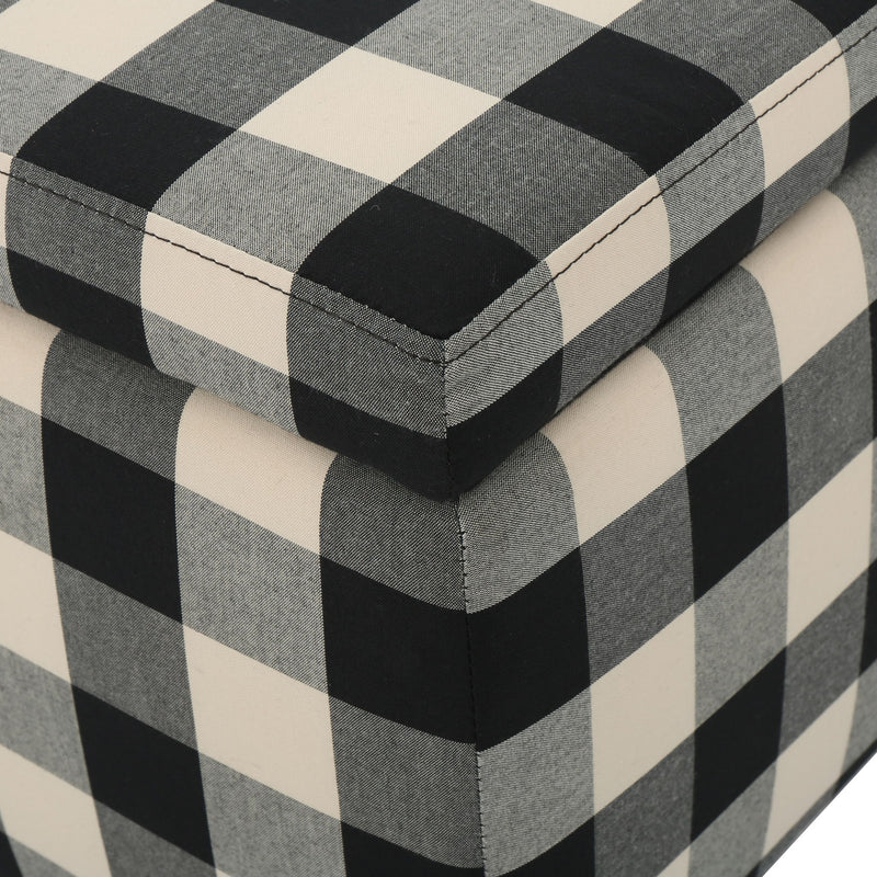 Black Noble House storage ottoman with seating and hidden storage, featuring a contemporary design and soft cushioned top.