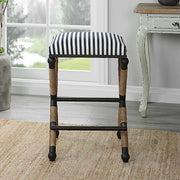 Black Uttermost Braddock backless counter stool with a sleek, modern design, suitable for 24-27 inch counter heights.