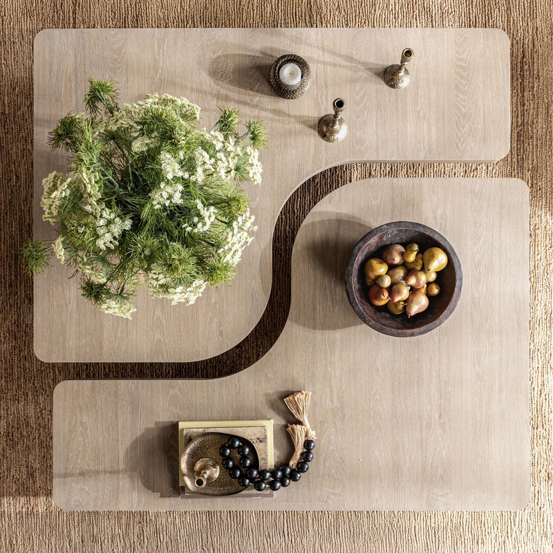 Classic Home Melina coffee table with a sleek wooden top and modern design, ideal for living room decor.
