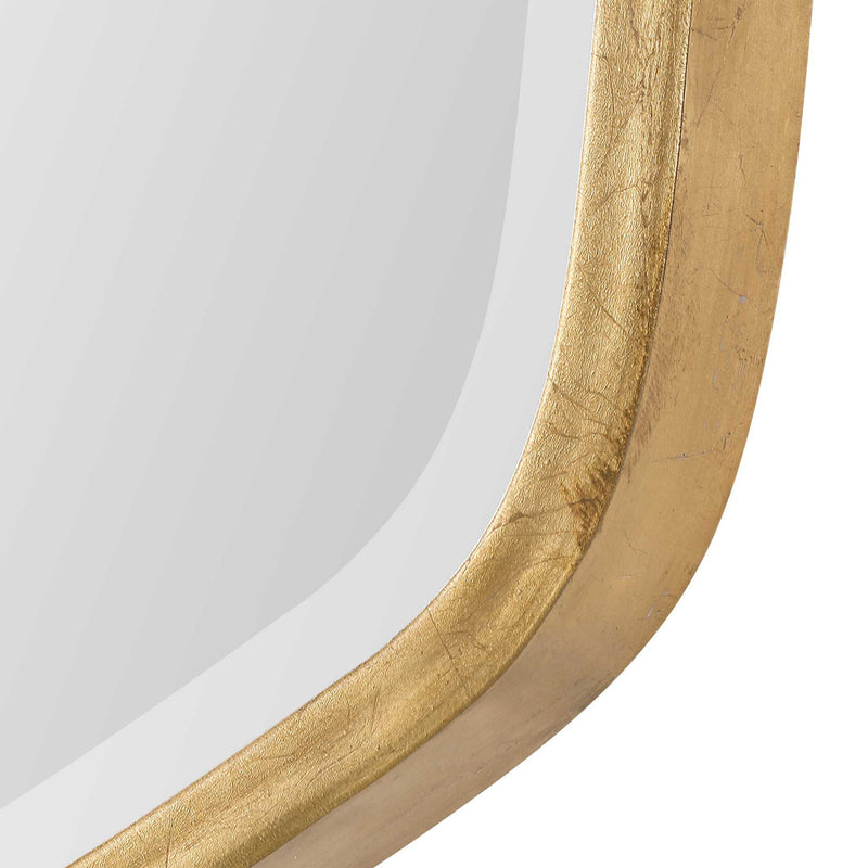 Uttermost Duronia Iron Wall Mirror with a sleek, contemporary frame, mounted on a wall, showcasing modern home decor style.